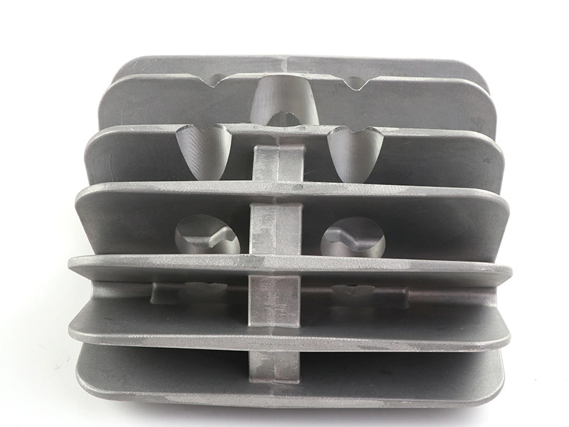 Blasted cast housing showing holes and edges for texture-zone inspection