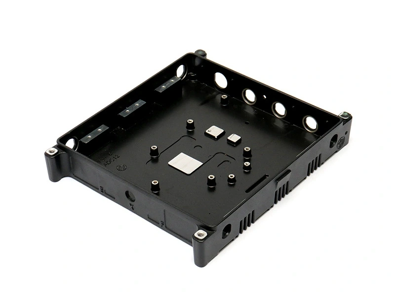 Interior of a finned cast housing with mounting bosses and interface pads