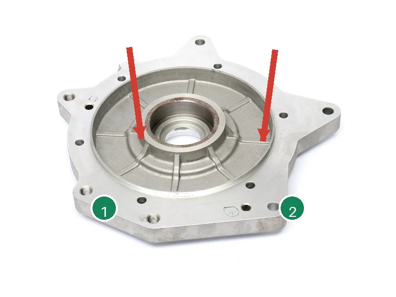 Illustrative clamp-direction and support-point overlay on a machined casting