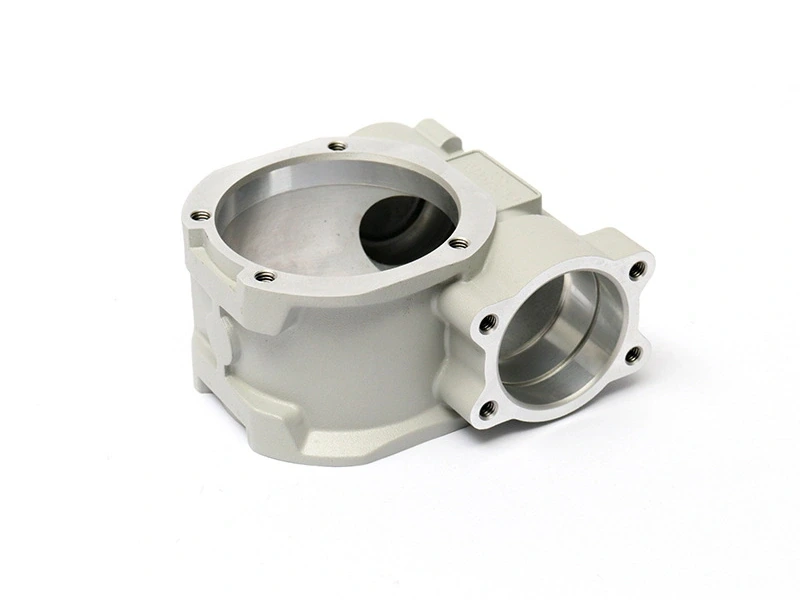 Gray coated cast housing showing finished surfaces and bare functional interfaces
