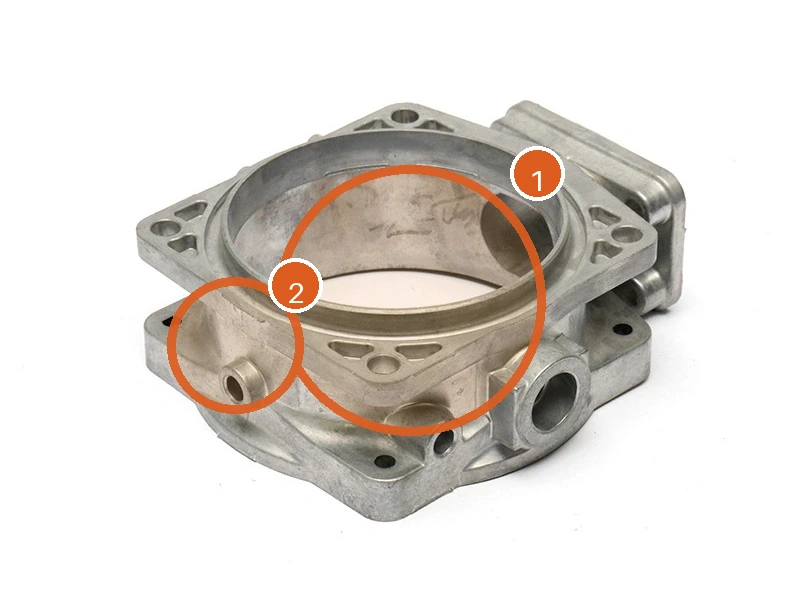 Illustrative porosity-risk zones around a machined bore and section transition