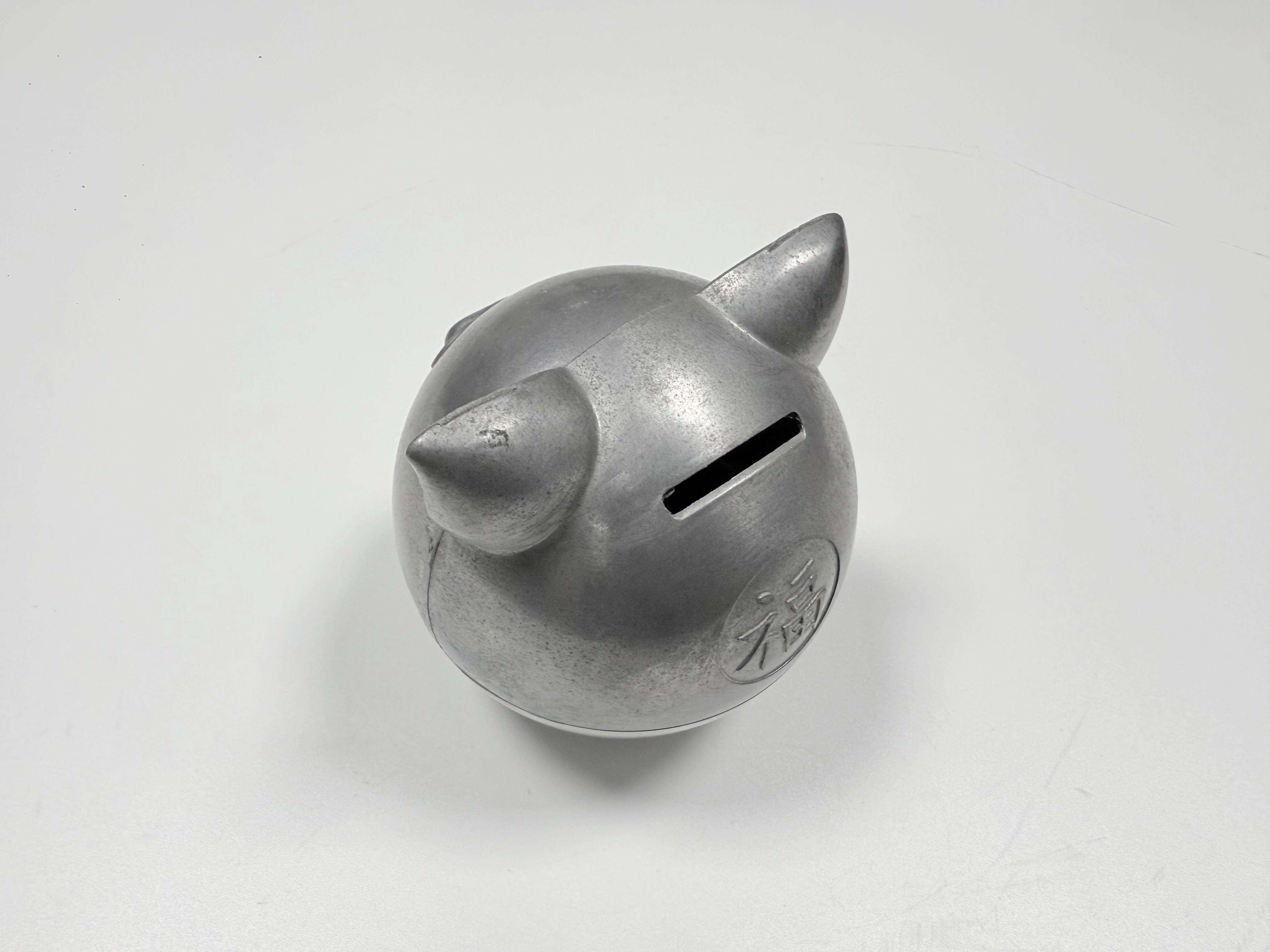 Roly-Poly Coin Bank: Zamak 5, CNC Fit, and PVD Finish